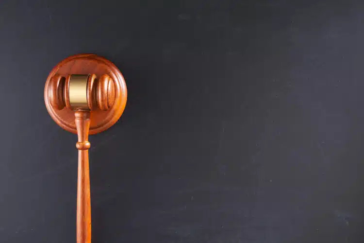 gavel hammer on top of blackboard